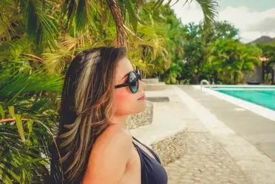 WOMAN BY POOL